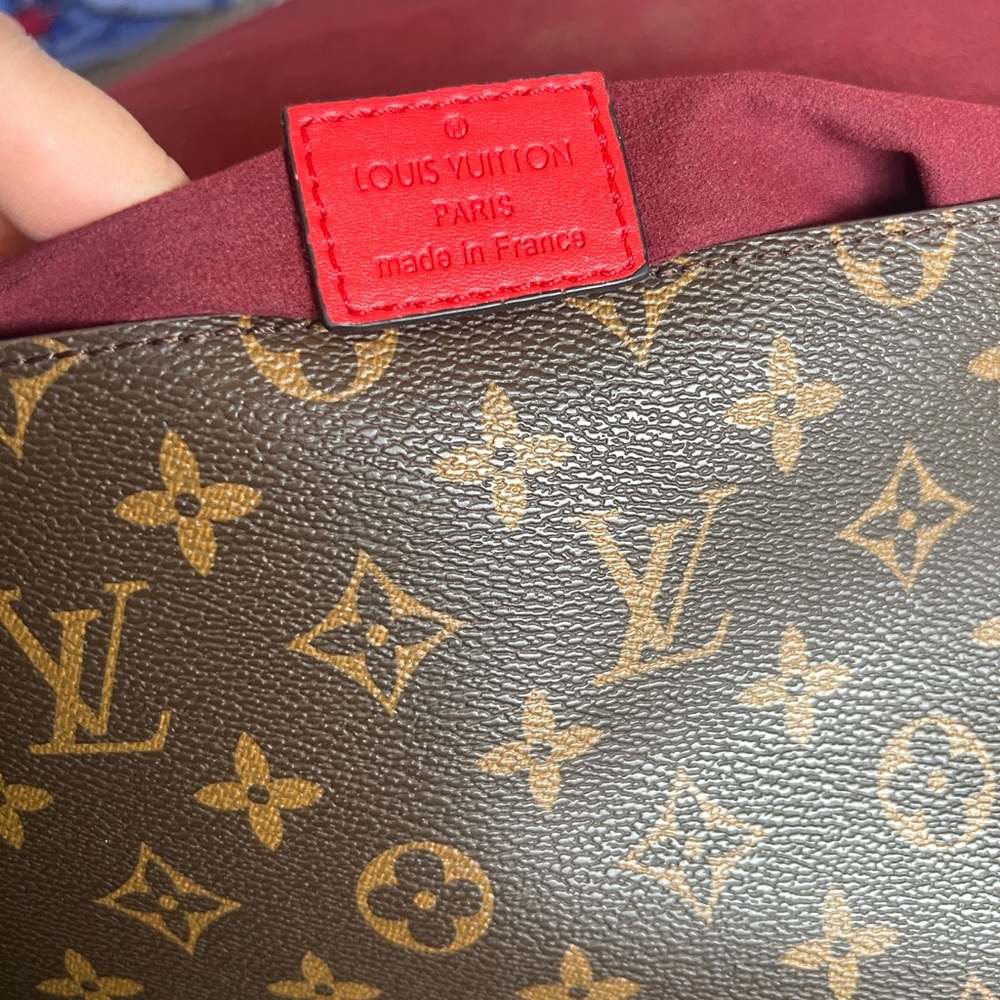 Louis Vuitton Monogram Bag with Vibrant Red Tags - Picture 3 of 5